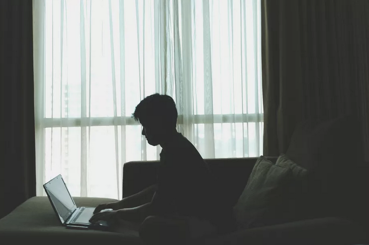 young boy surfing the net, journal of wild culture ©2021