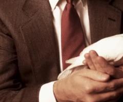 Man holding dove_journal of wild culture