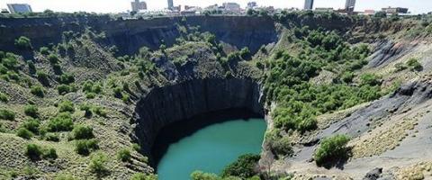 Green pool in ground